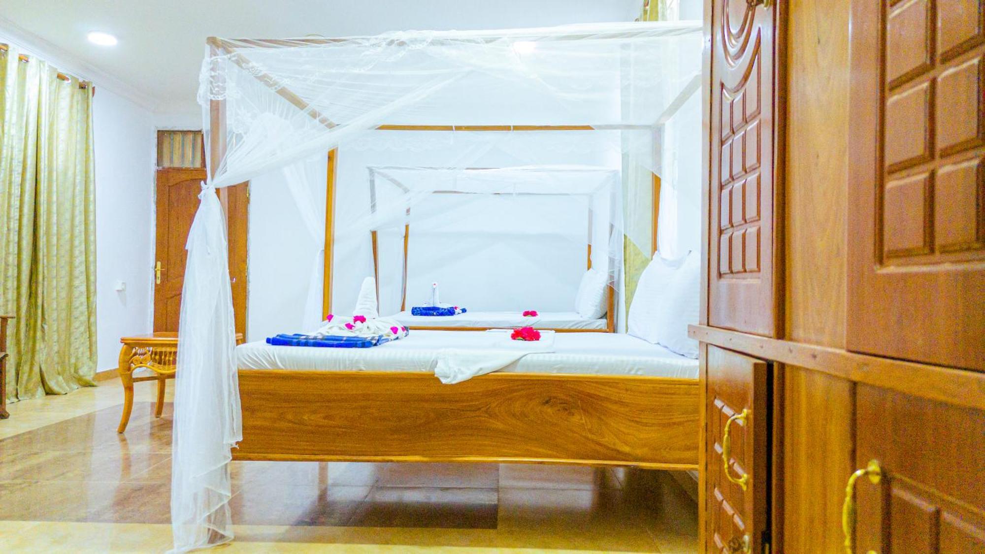 Sands Inn Hotel Pwani Mchangani Bagian luar foto