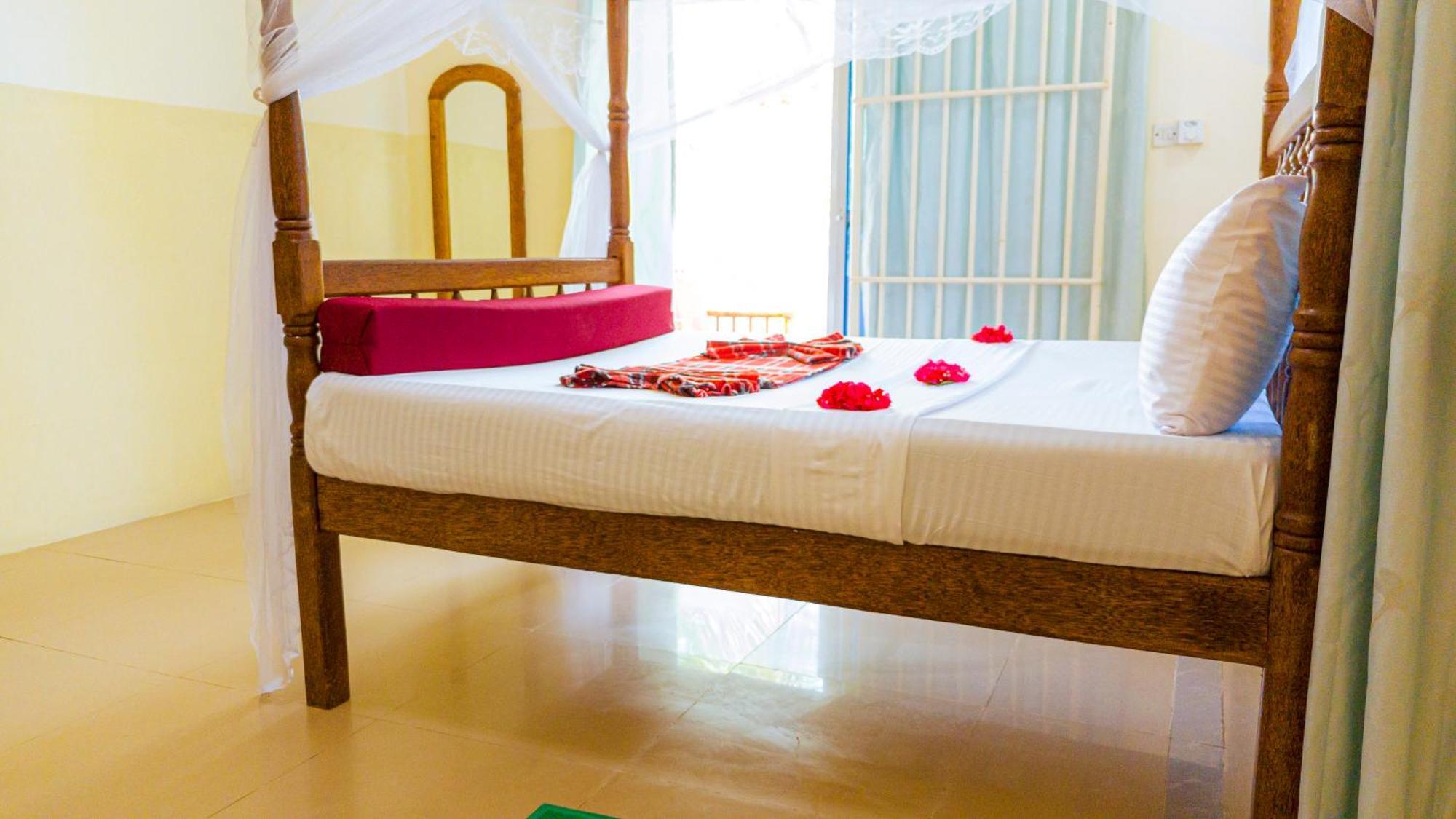 Sands Inn Hotel Pwani Mchangani Bagian luar foto