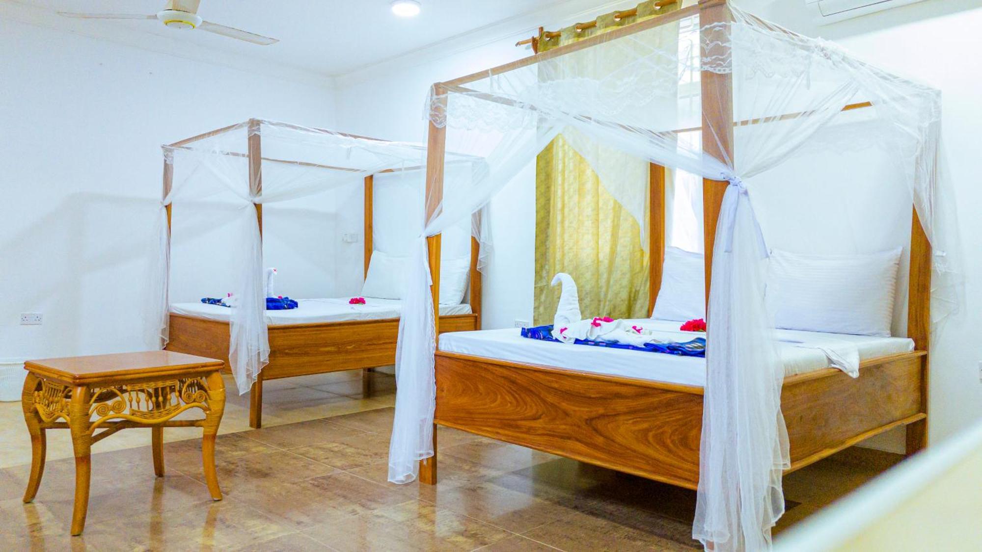 Sands Inn Hotel Pwani Mchangani Bagian luar foto