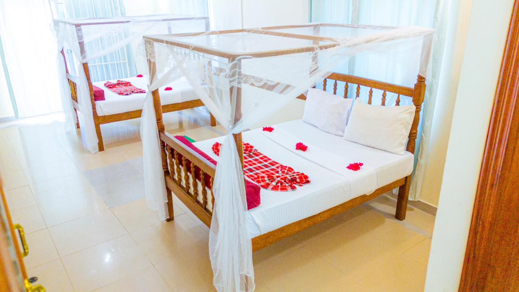 Sands Inn Hotel Pwani Mchangani Bagian luar foto