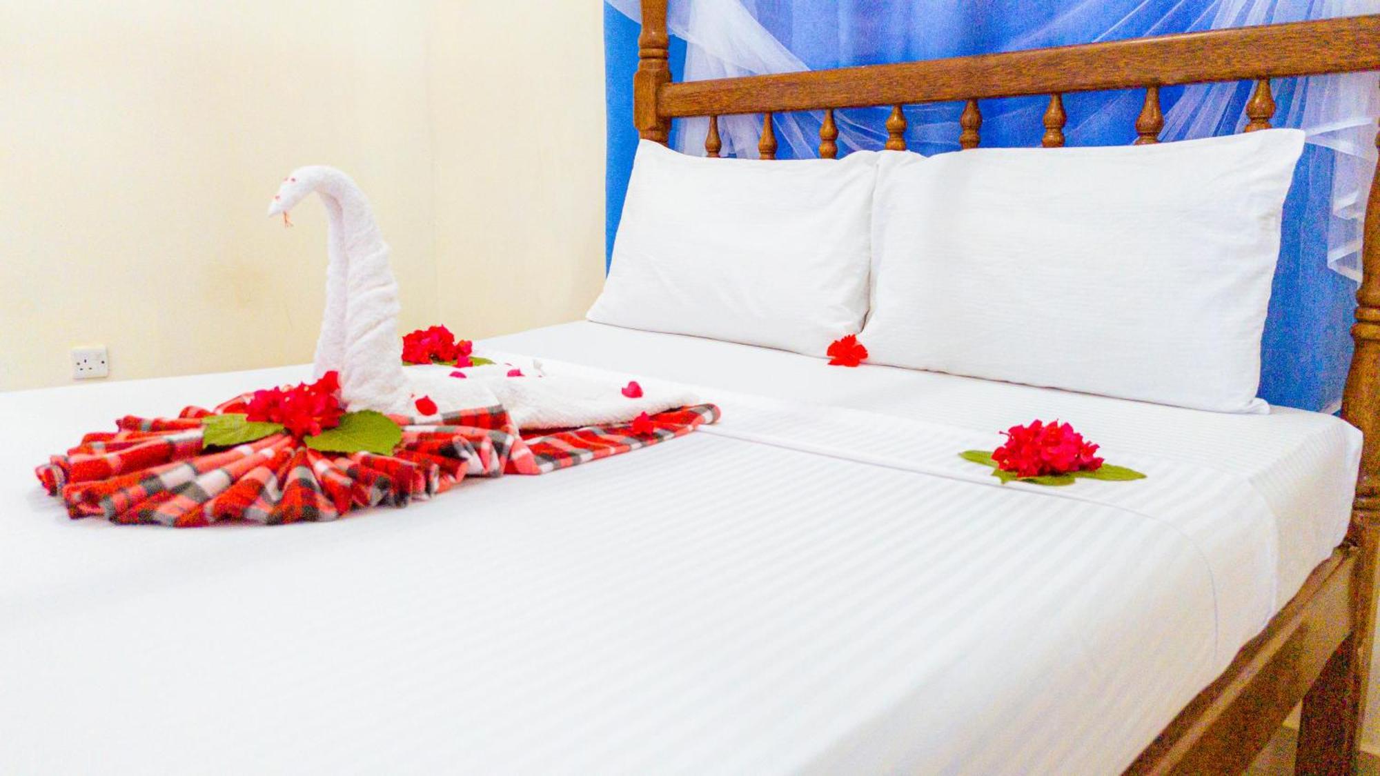 Sands Inn Hotel Pwani Mchangani Bagian luar foto