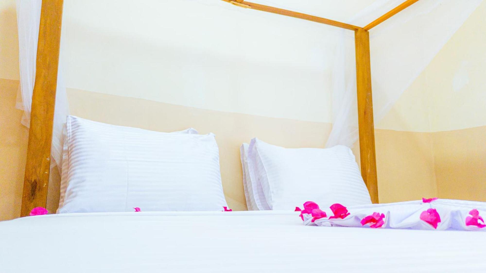 Sands Inn Hotel Pwani Mchangani Bagian luar foto